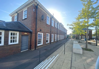 Side of main building and edge of courtyard